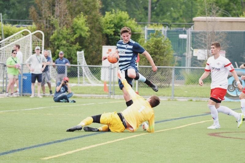 Match photo from AFC Ann Arbor men versus Lansing United (2015-06-07).