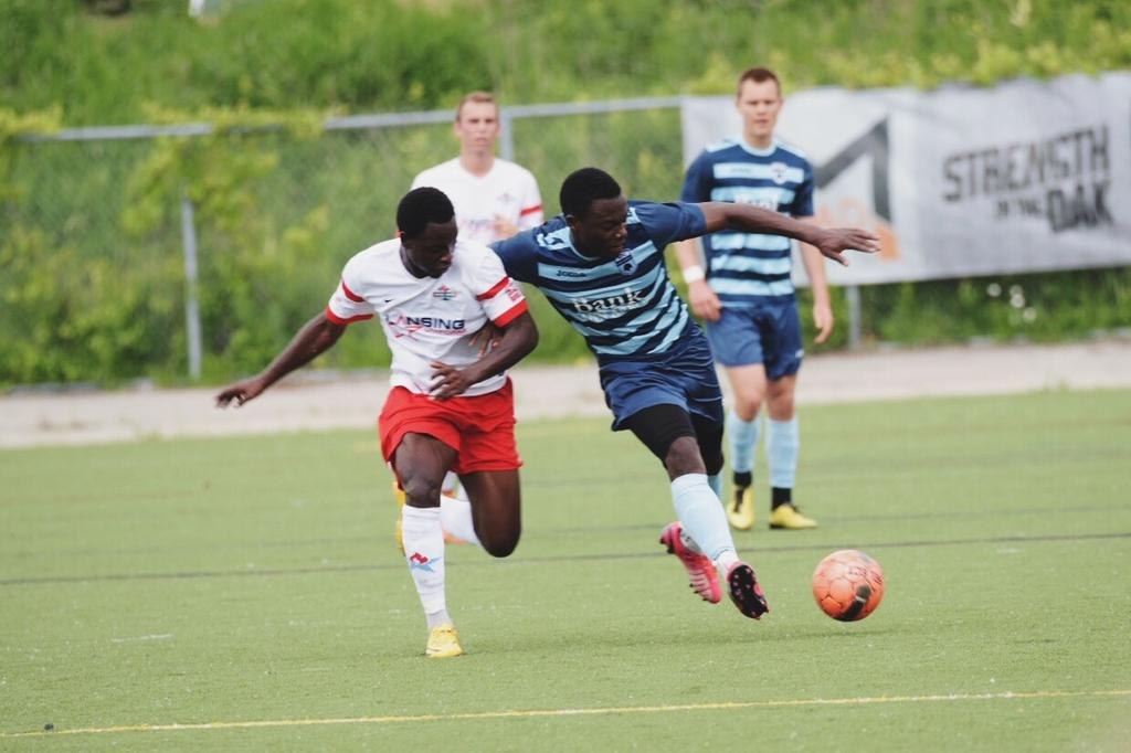 Match photo from AFC Ann Arbor men versus Lansing United (2015-06-07).