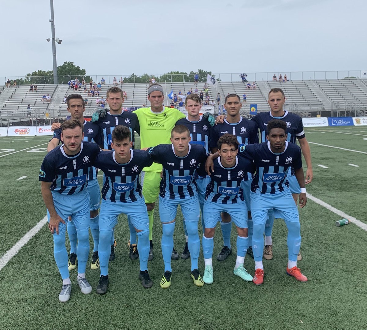 AFC Ann Arbor men lineup before the 2019-06-30 match against Grand Rapids FC.